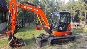 Excavator pond construction Texas
