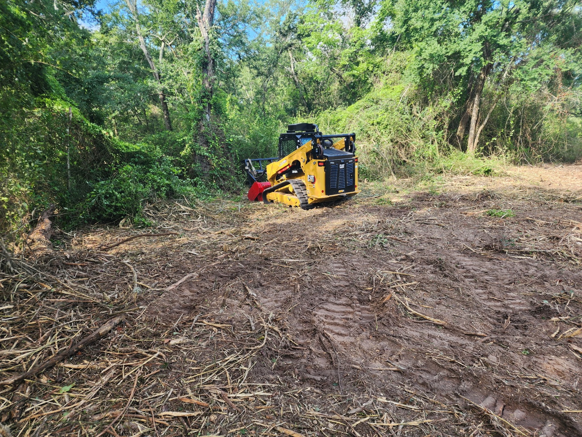 Hydro-Ax forestry mulcher clearing brush Montgomery TX